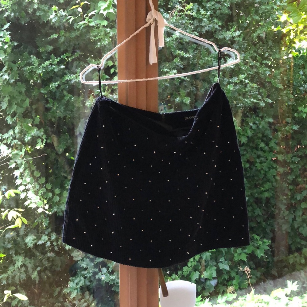 Black studded mini skirt